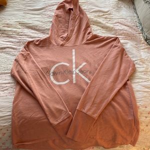 Pink/Coral Calvin Klein hooded, long sleeve pullover. Size S.